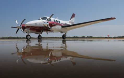 Private jet on field